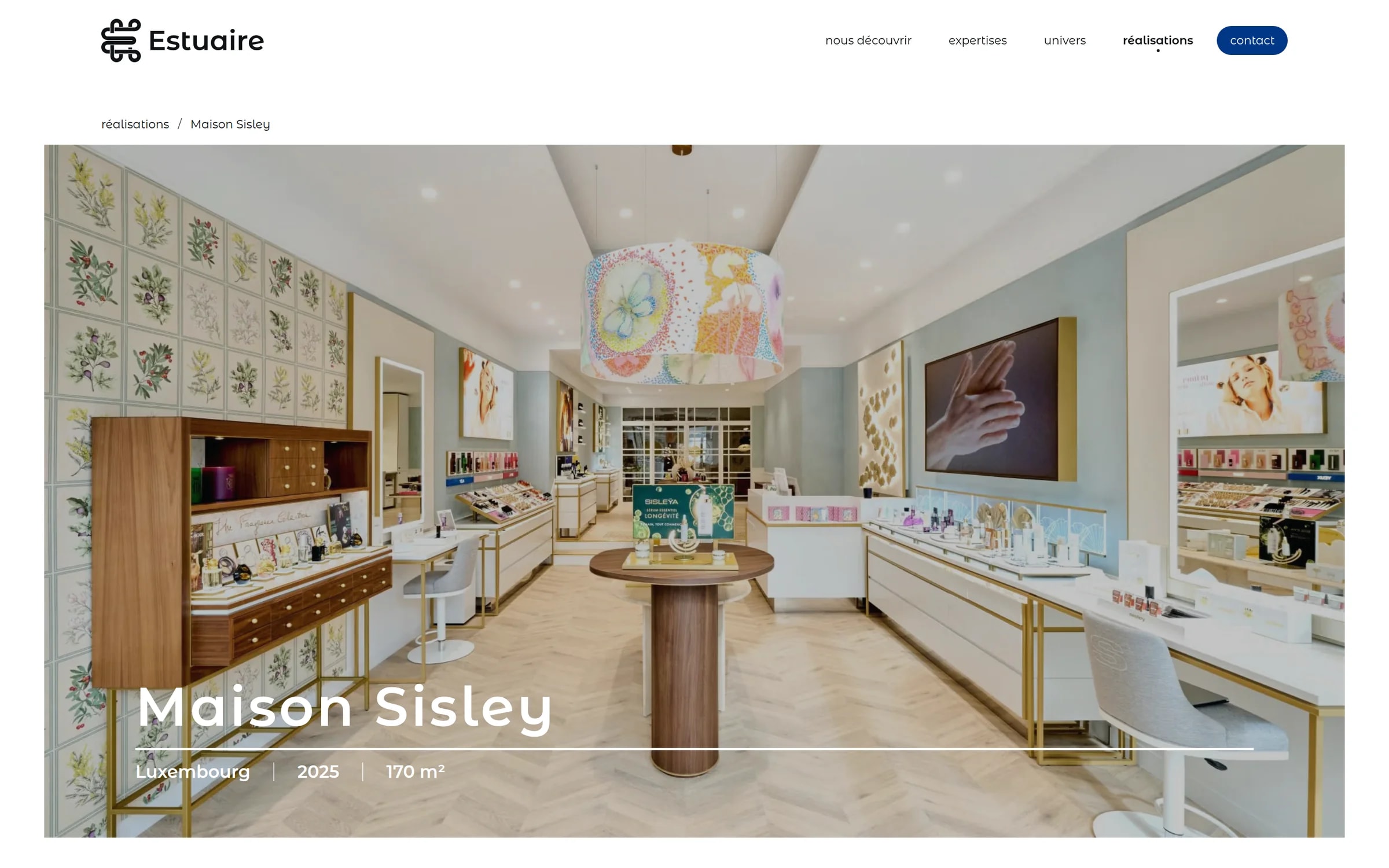 Maison Sisley case study: a fitted beauty boutique with floral wall panels and wooden display counters, captioned Luxembourg, 2025, 170 m².